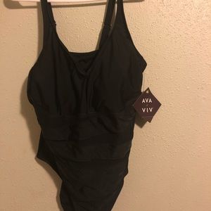 NWT black swimsuit with sheer inserts